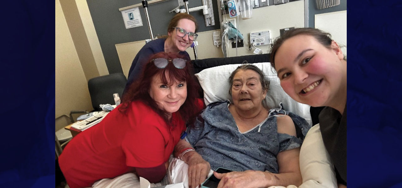 Cornerstone Specialty Hospital patient Ella poses with her care team